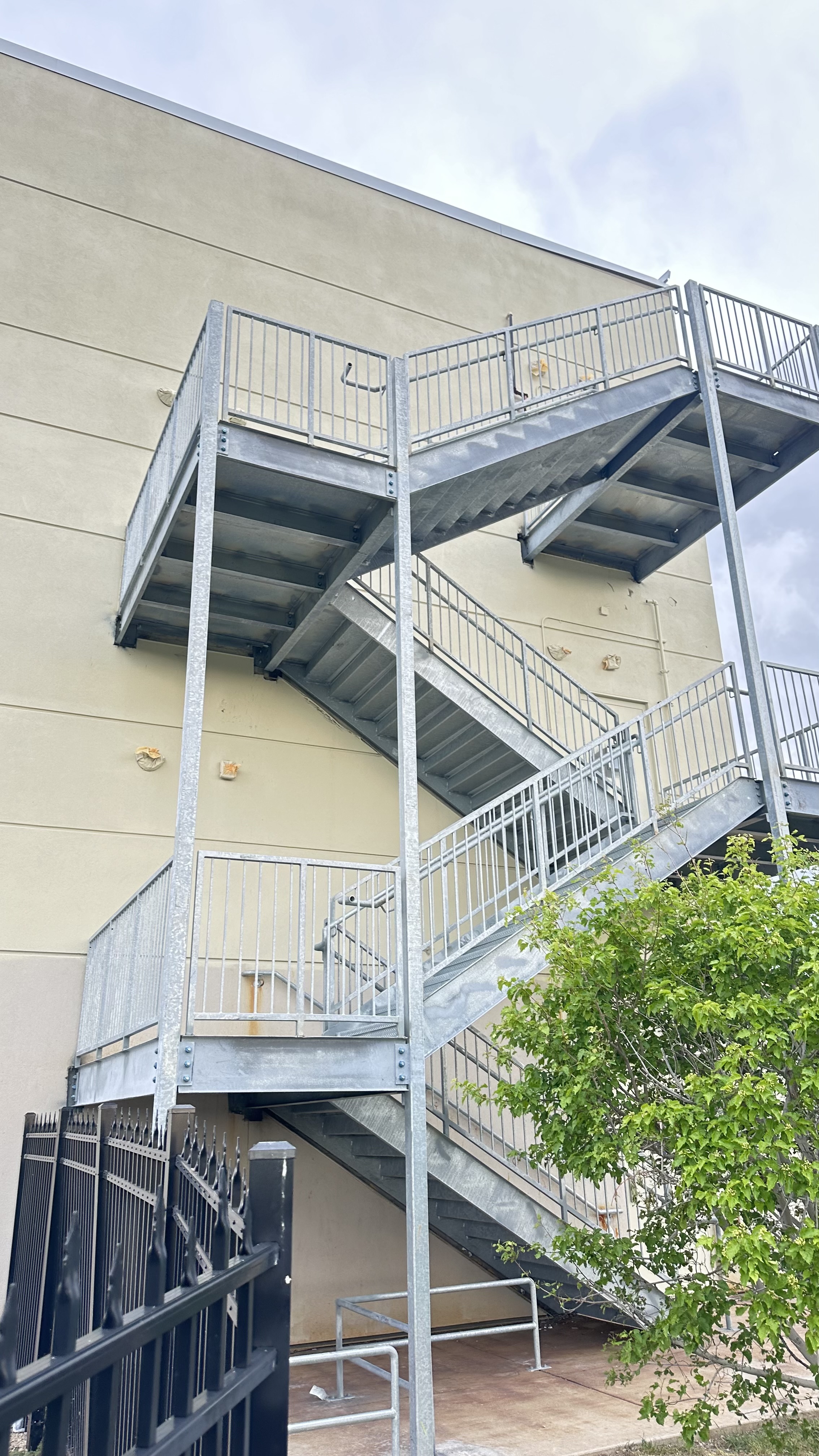 CSK galvanized exterior stairs with continuous flights, landings, and guardrails
